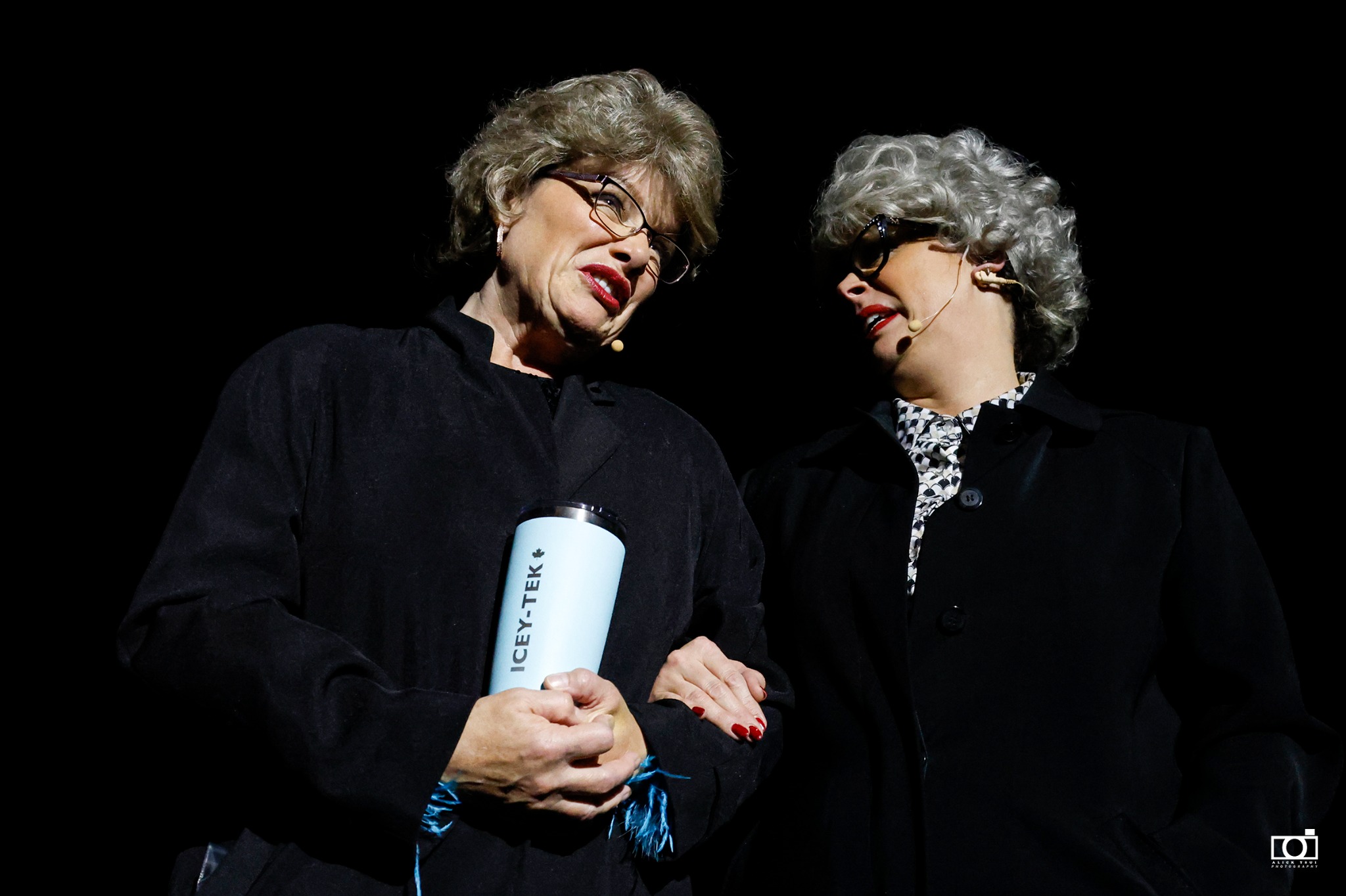 Sheila performing two comedy characters